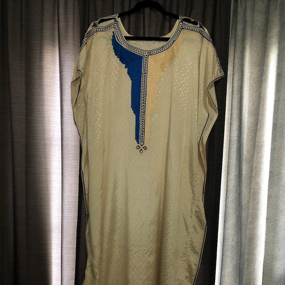 Embroidered white caftan.